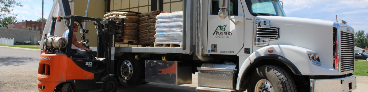 Forklift putting products in Ag Partners truck